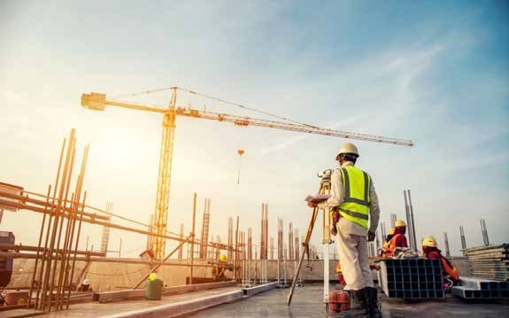 Surveyor on a civil construction site