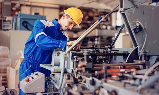 Mechanical engineer operating machinery