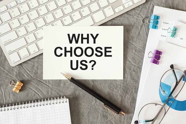 Why choose us card on a desk